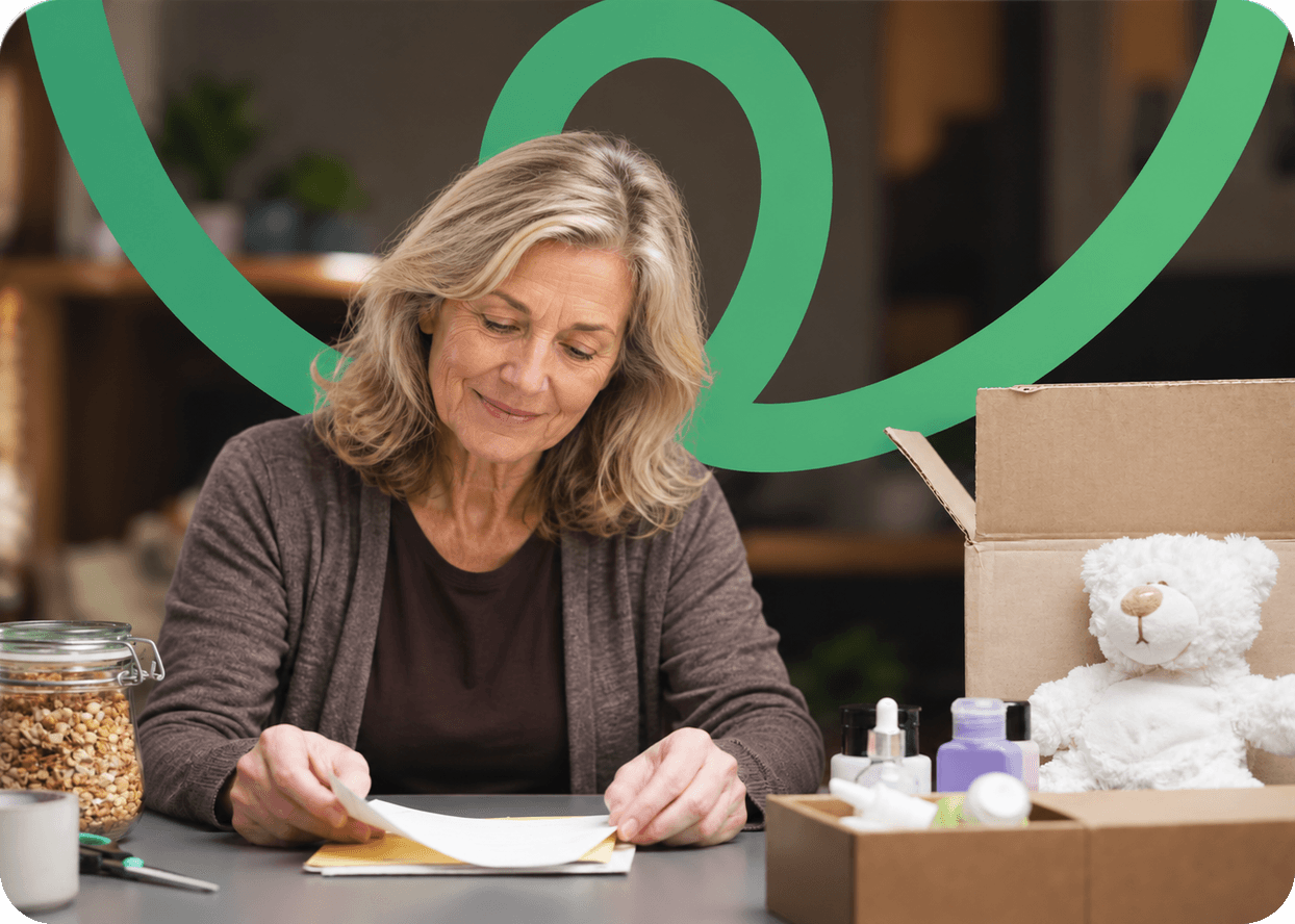 Two people handing over a parcel